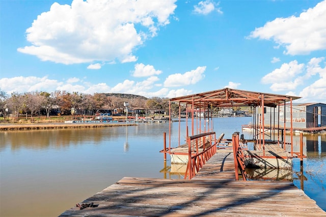 dock area featuring a water view