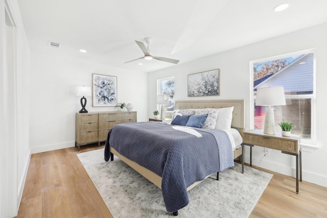 bedroom featuring ceiling fan and wood-type flooring