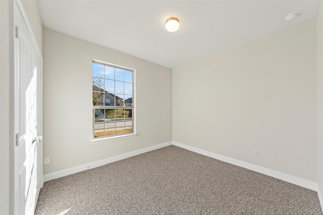 spare room with carpet flooring