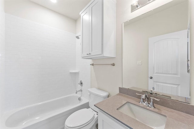 full bathroom featuring vanity, toilet, and tiled shower / bath