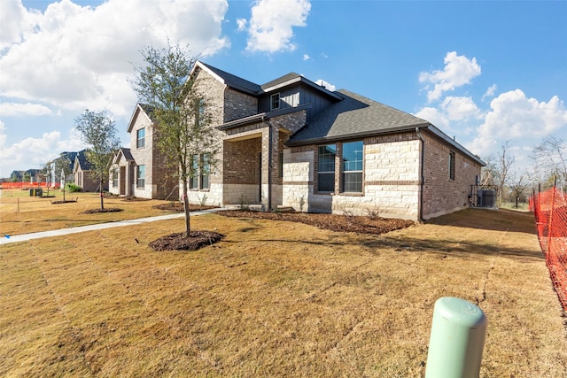 view of front of home with a front lawn