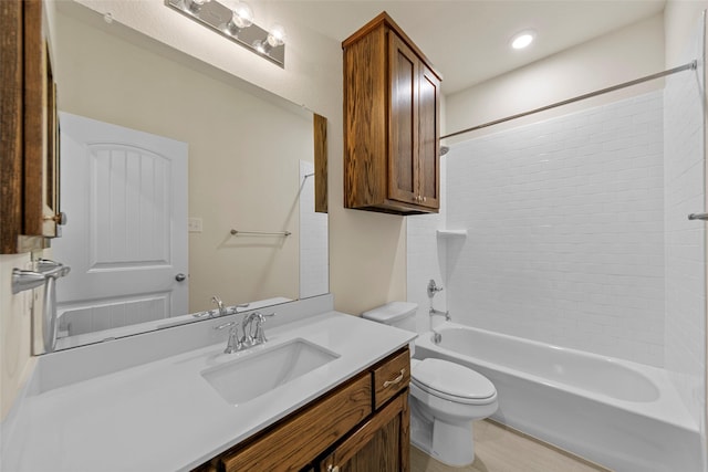 full bathroom with vanity,  shower combination, and toilet