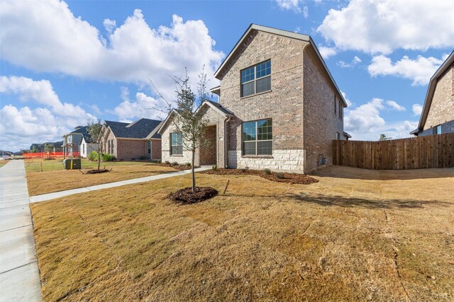 view of front of property with a front lawn