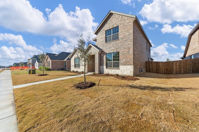 view of front of house with a front lawn