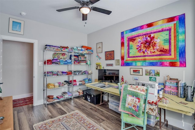 game room with hardwood / wood-style flooring and ceiling fan