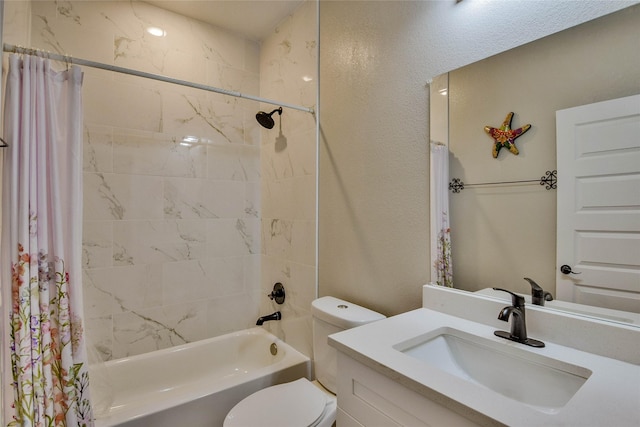 full bathroom with shower / bath combination with curtain, vanity, and toilet