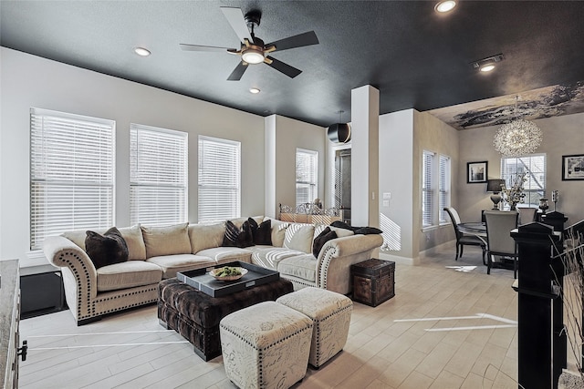 living room featuring ceiling fan