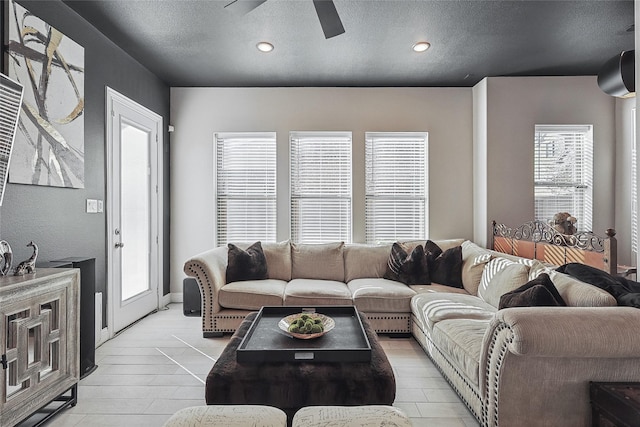 living room with ceiling fan