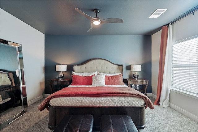 carpeted bedroom featuring ceiling fan