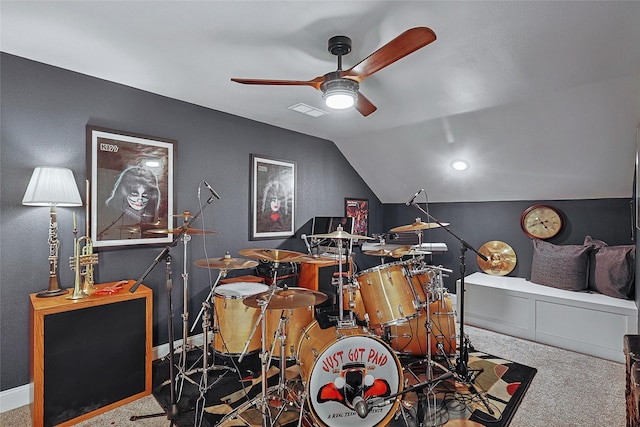 game room featuring ceiling fan, vaulted ceiling, and carpet