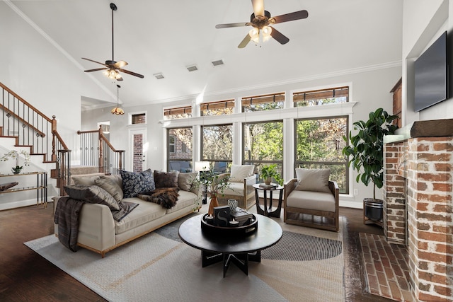 living room featuring crown molding, ceiling fan, dark hardwood / wood-style floors, and high vaulted ceiling