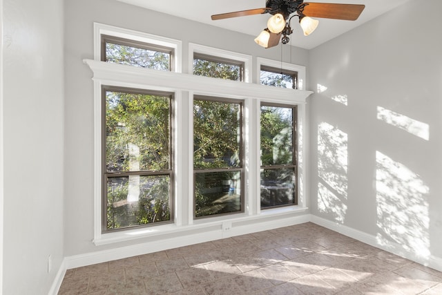 interior space featuring ceiling fan