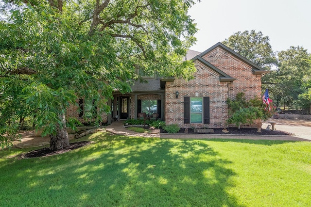 view of front of property with a front lawn