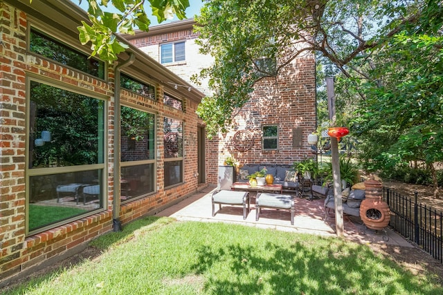 view of yard featuring outdoor lounge area and a patio area