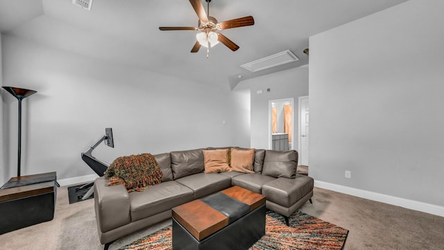 living room with ceiling fan, lofted ceiling, and carpet floors