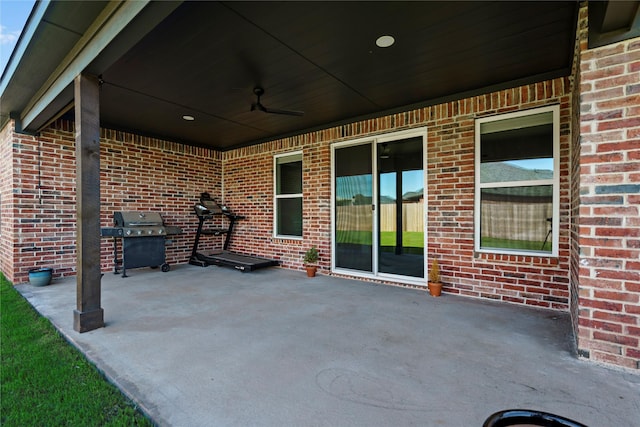 view of patio / terrace featuring a grill and ceiling fan