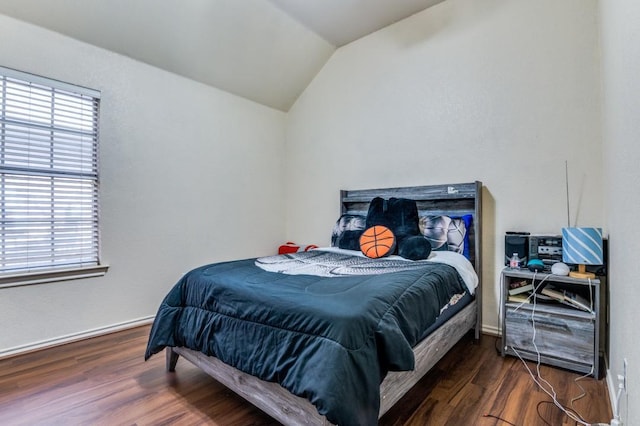 1330 Lyra Ln, Arlington, TX 76013 - bedroom featuring baseboards, wood finished floors, and lofted ceiling