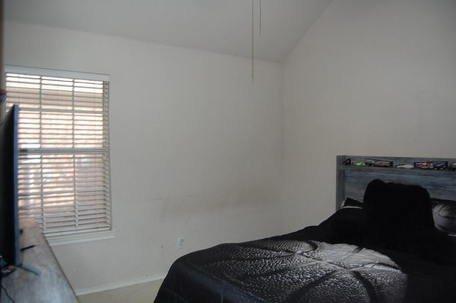 bedroom featuring baseboards