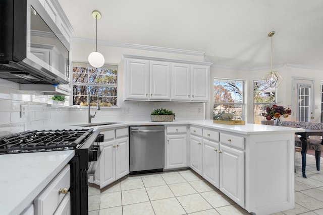 kitchen featuring backsplash, light tile patterned flooring, white cabinets, and stainless steel appliances