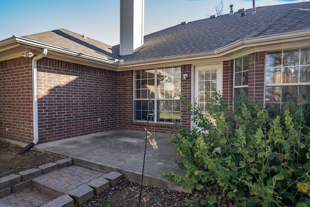 back of house with a patio area