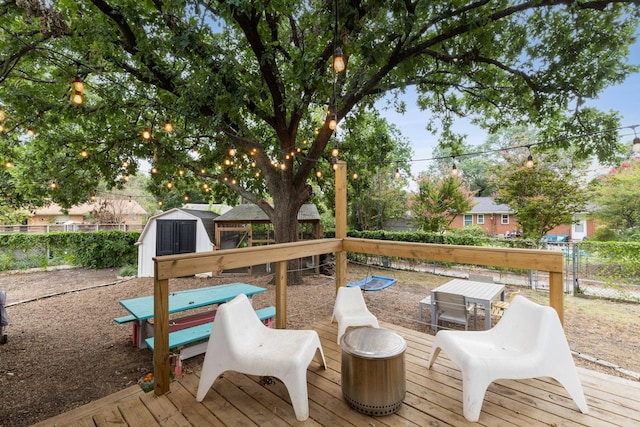 deck featuring a storage shed