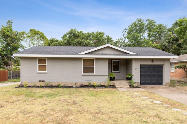 ranch-style house with a front lawn and a garage