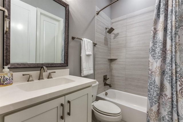 full bathroom with shower / bathtub combination with curtain, vanity, and toilet