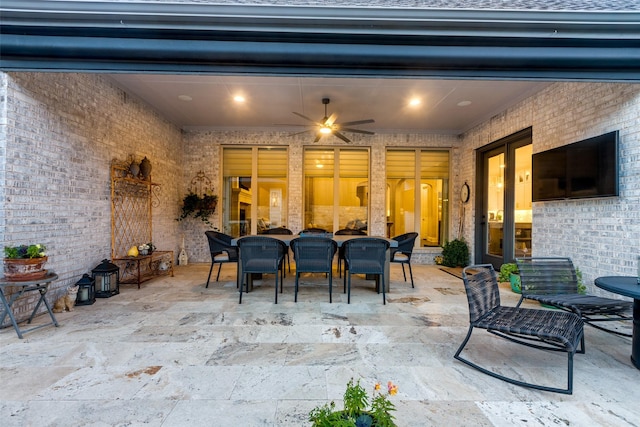 view of patio / terrace featuring ceiling fan