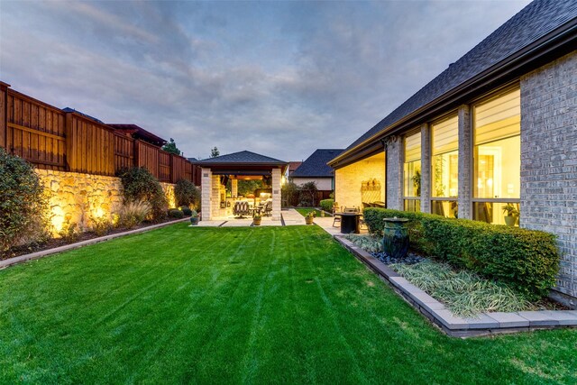 view of yard with a gazebo and a patio area