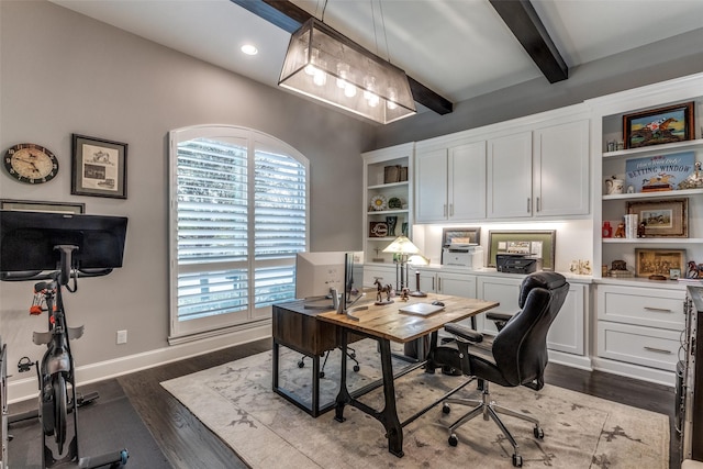 office space with wood-type flooring and beam ceiling