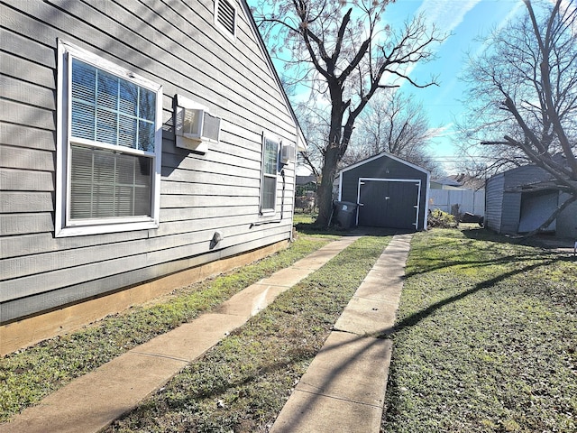 view of side of property featuring a yard and a storage shed