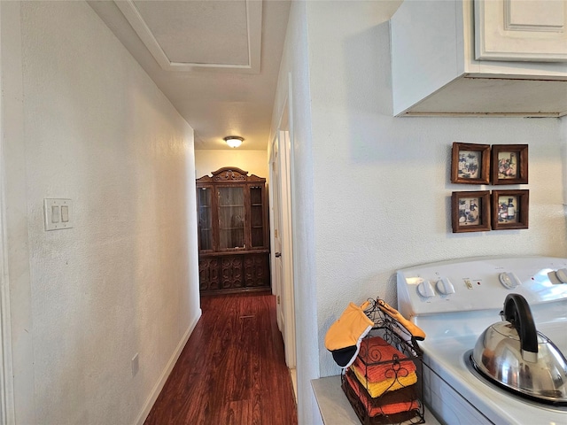 hall with dark hardwood / wood-style floors and washer / clothes dryer