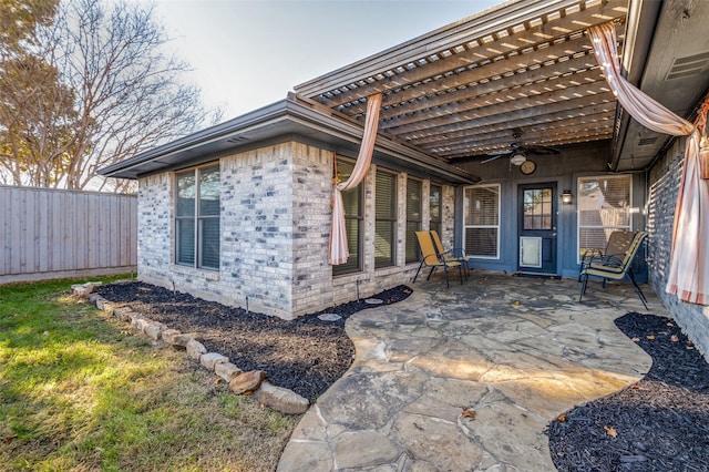 exterior space with a patio and ceiling fan