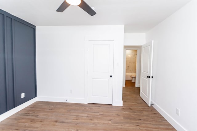 unfurnished bedroom featuring light hardwood / wood-style floors and ceiling fan