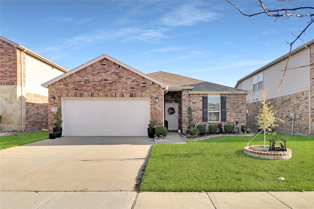 view of front facade with a garage and a front lawn