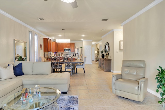 living room featuring crown molding, light tile patterned floors, and ceiling fan