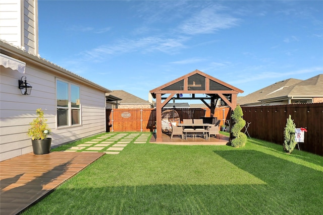 view of yard featuring a gazebo, outdoor lounge area, and a patio