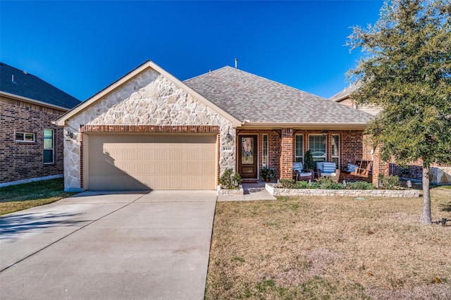 ranch-style home with a porch, a front yard, and a garage