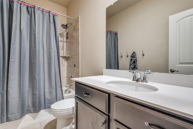 full bathroom featuring tile patterned flooring, vanity, shower / tub combo, and toilet