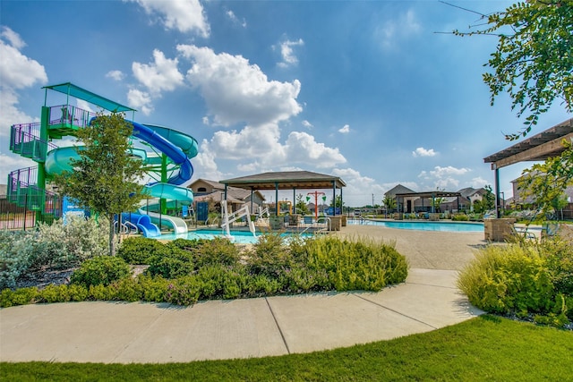 view of property's community with a swimming pool