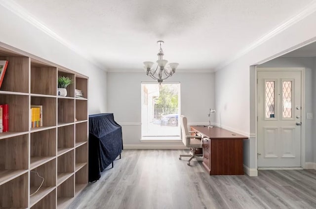 office space with an inviting chandelier, crown molding, a textured ceiling, and light wood-type flooring