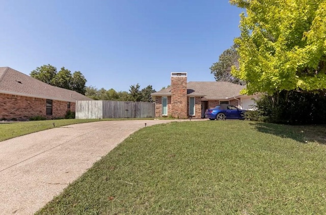 view of front of home with a front yard