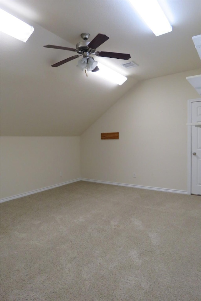 313 Hidden Lake Ct, Burleson, TX 76028 - additional living space featuring lofted ceiling, a ceiling fan, light colored carpet, and baseboards