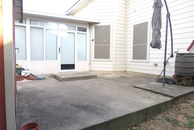 view of patio / terrace with a sunroom