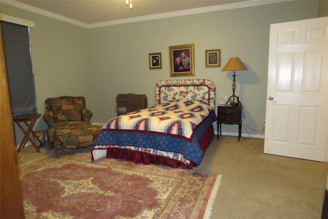 bedroom featuring ornamental molding, carpet, and baseboards