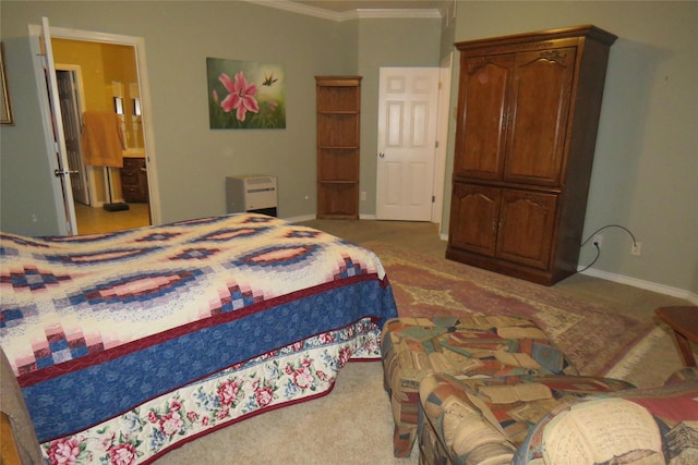 bedroom with carpet, connected bathroom, ornamental molding, and baseboards