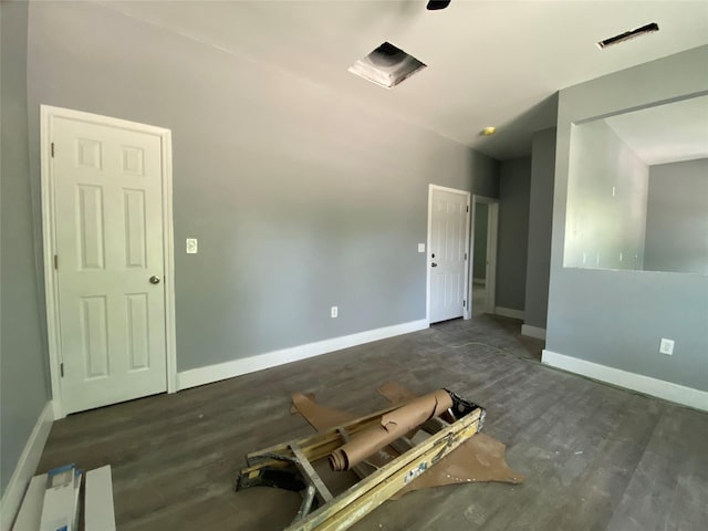 unfurnished room featuring dark hardwood / wood-style floors