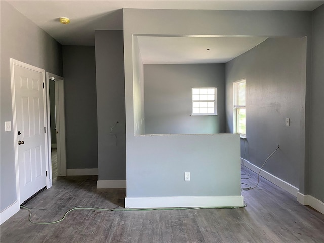 spare room with wood-type flooring