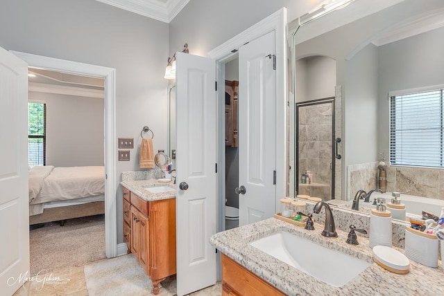 bathroom with ornamental molding, shower with separate bathtub, and vanity