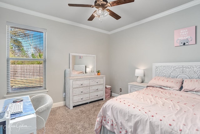 bedroom featuring ornamental molding, light colored carpet, and ceiling fan